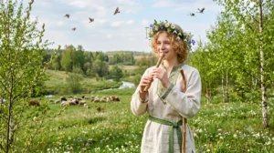 Лель в славянской мифологии играет на свирели среди весеннего луга и цветущих берёз